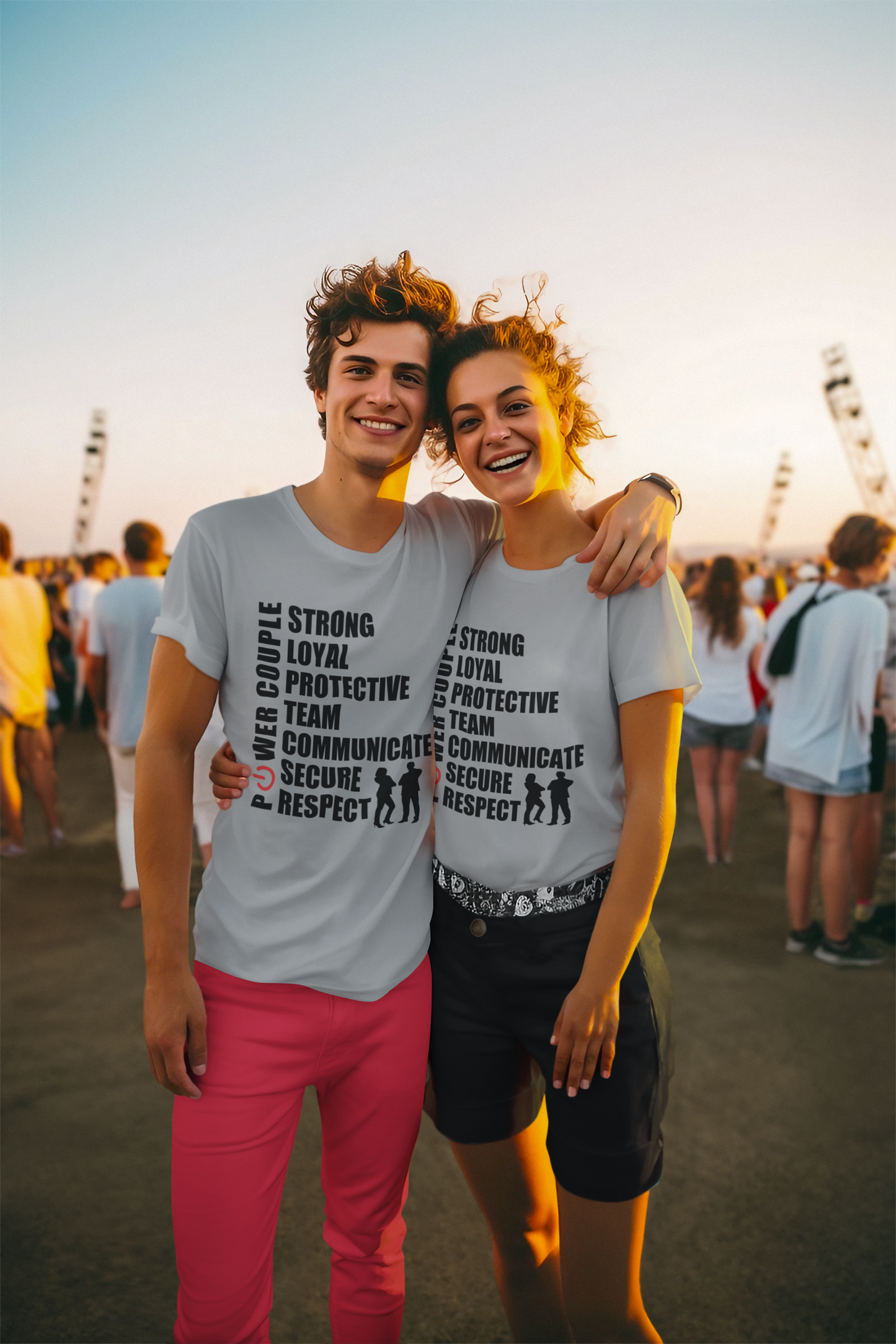 A couple wearing a gray shirt written Power Couple. This is the Unbreakable Couple Team Shirt