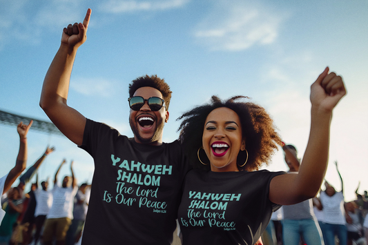 A couple wearing a black shirt with green lettering saying: Yahveh Shalom, The Lord Is Our Peace.